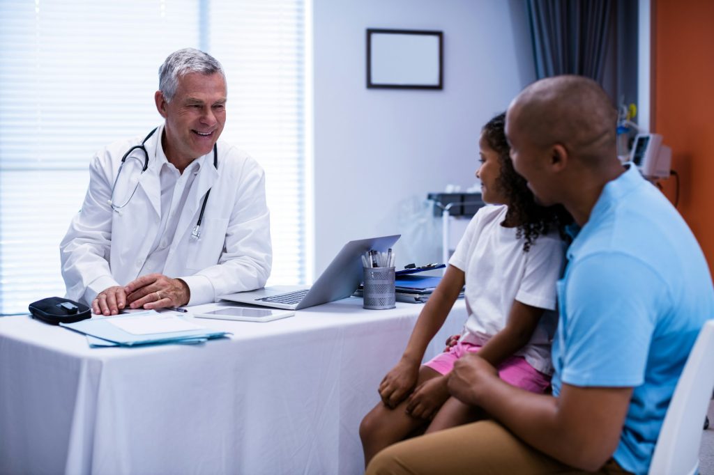 Doctor and patient interacting with each other