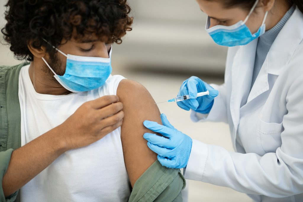 Indian Man Getting Vaccinated Against Covid-19 At Clinic